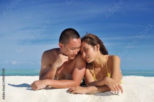 happy young  couple enjoying summer on beach © .shock