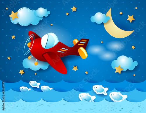 Red airplane over the sea