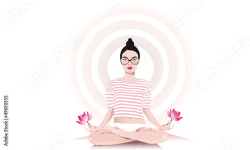 young woman practices yoga in lotus position 