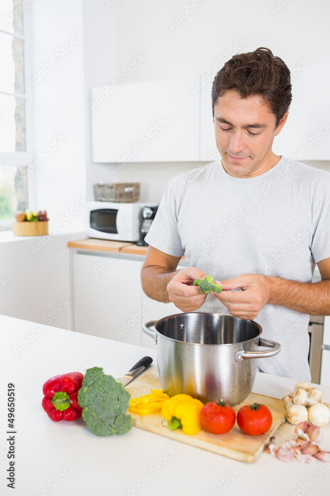 Man making vegetarian dinner Man making vegetarian dinner