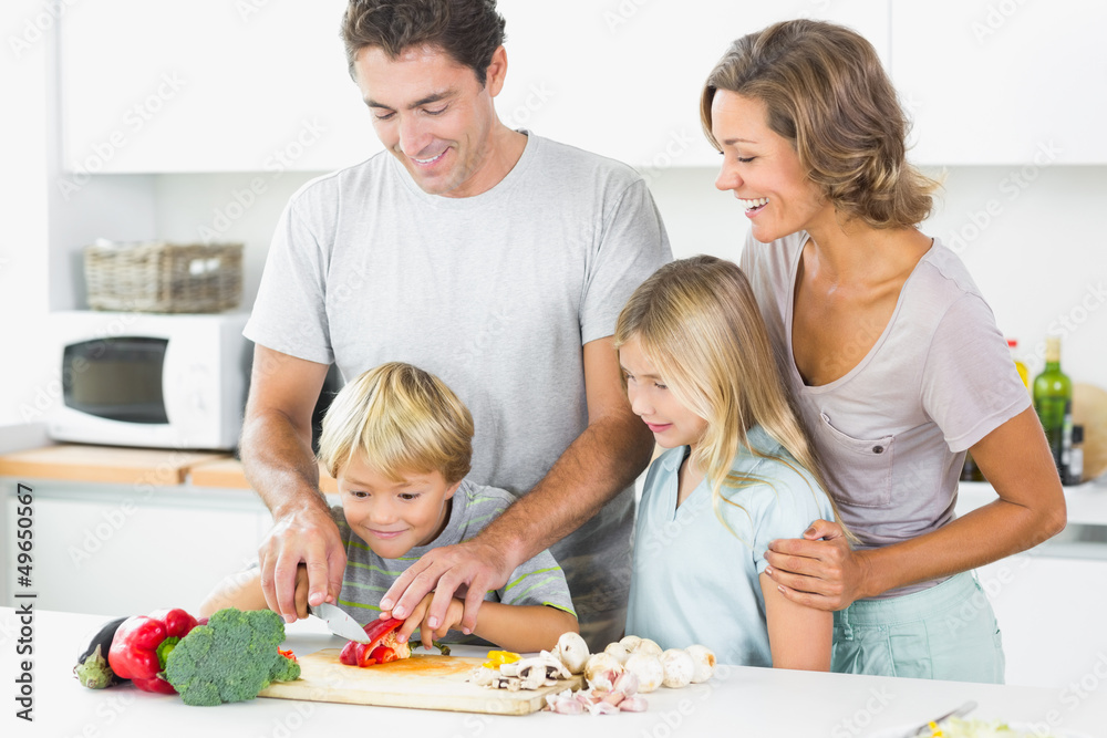 Family preparing vegetables together