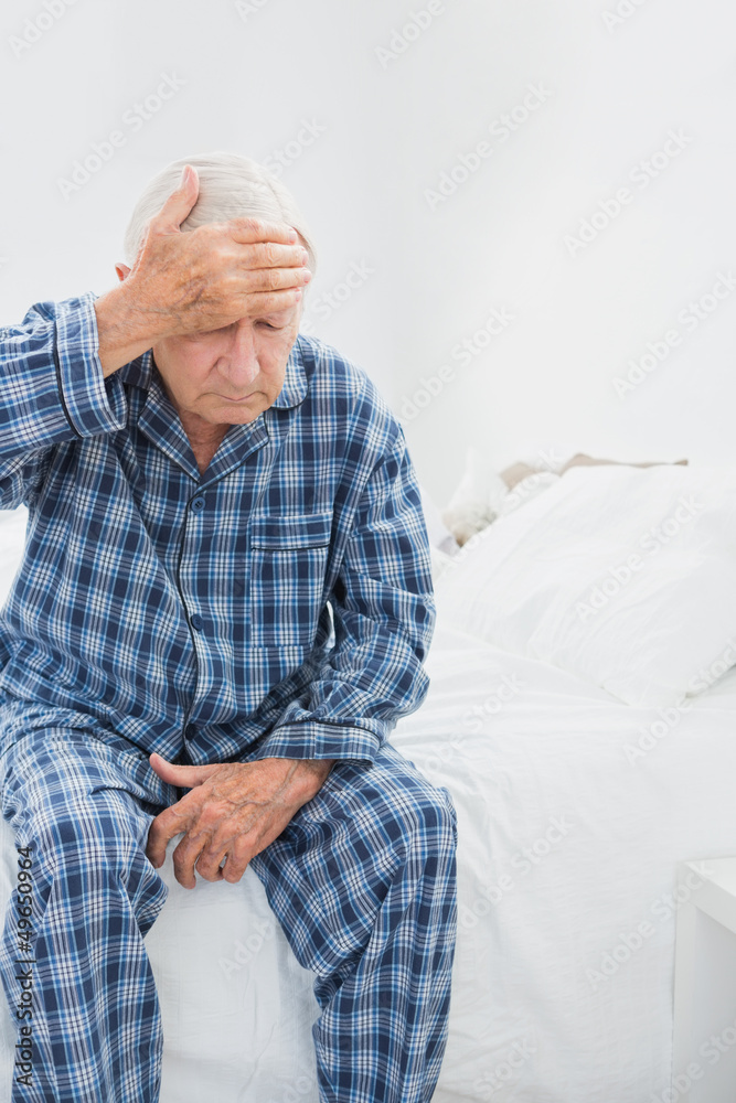 Old man suffering on the bed Old man suffering on the bed