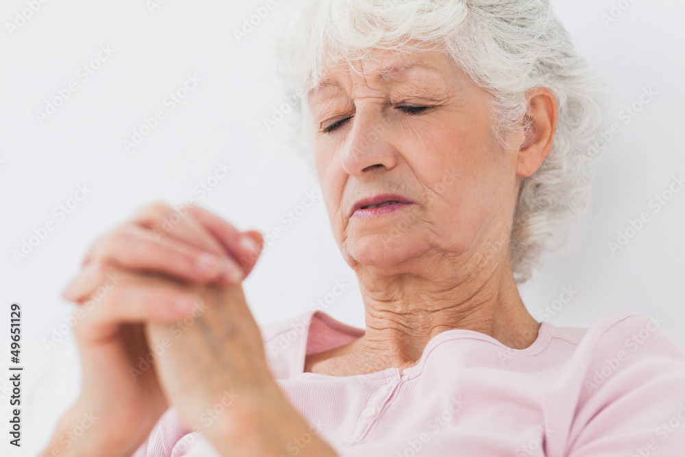 Woman saying her prayers Woman saying her prayers