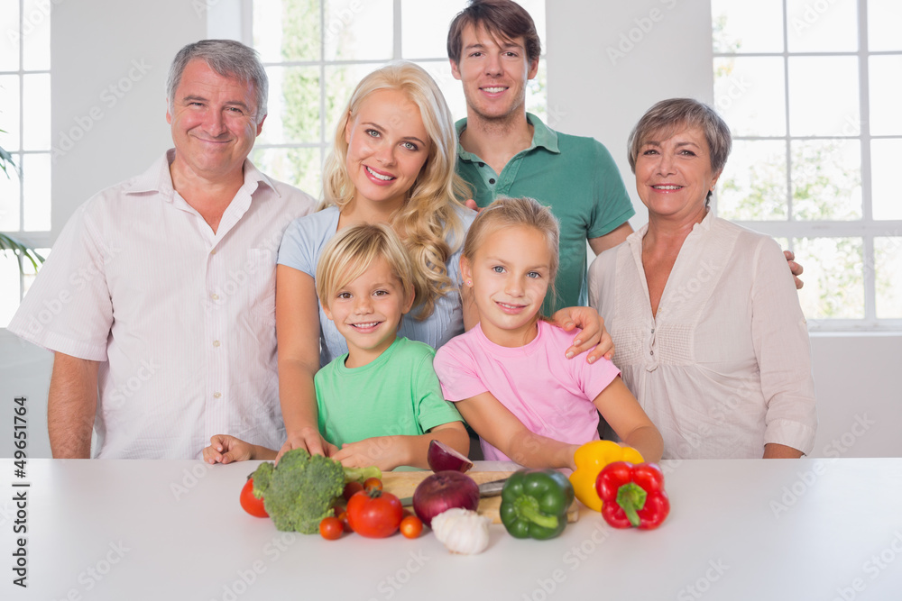 Family smiling with vegetables Family smiling with vegetables