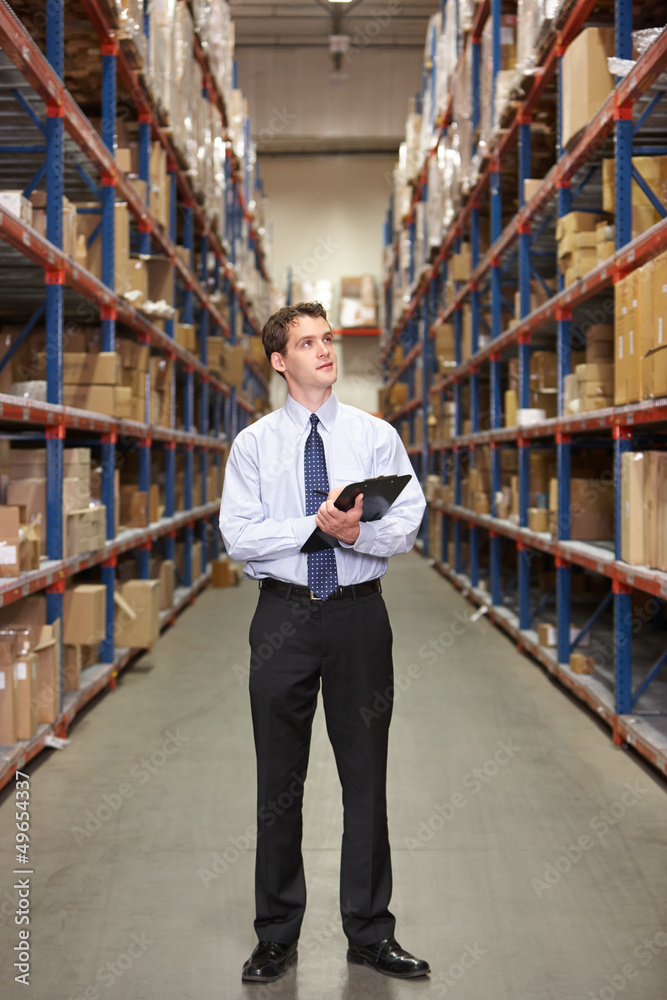Manager In Warehouse With Clipboard Manager In Warehouse With Clipboard