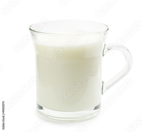 Transparent glass cup with milk