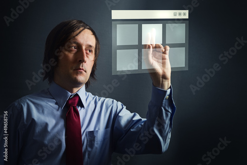 Businessman with touch screen
