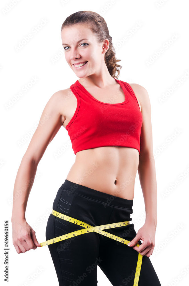 Young girl with centimeter in dieting concept Young girl with centimeter in dieting concept