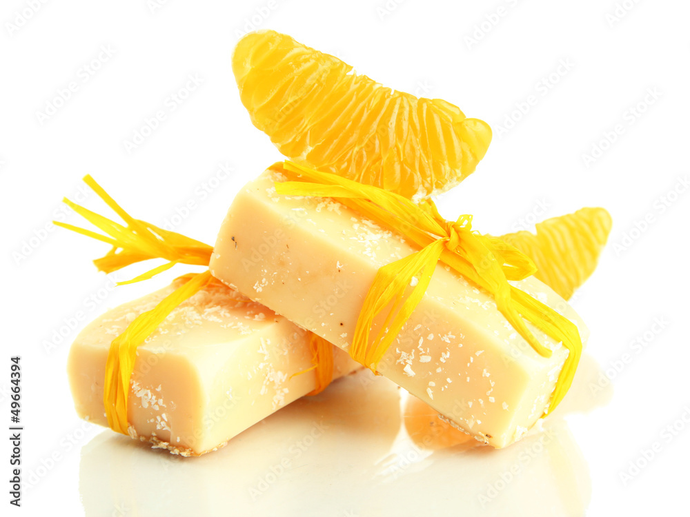 Natural handmade soap and orange, isolated on white Natural handmade soap and orange, isolated on white