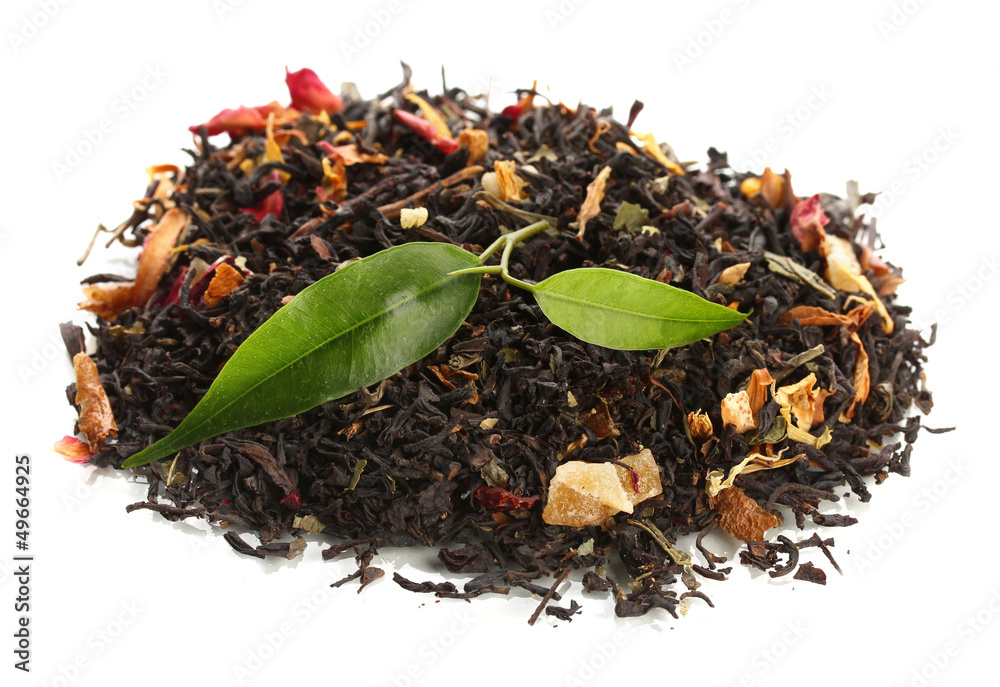 Fototapeta premium Dry black tea with green leaves, isolated on white