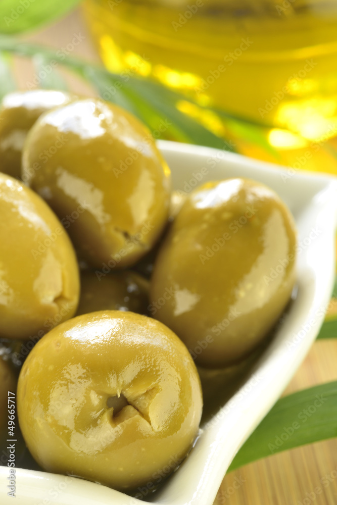 Stuffed green olives and olive oil macro