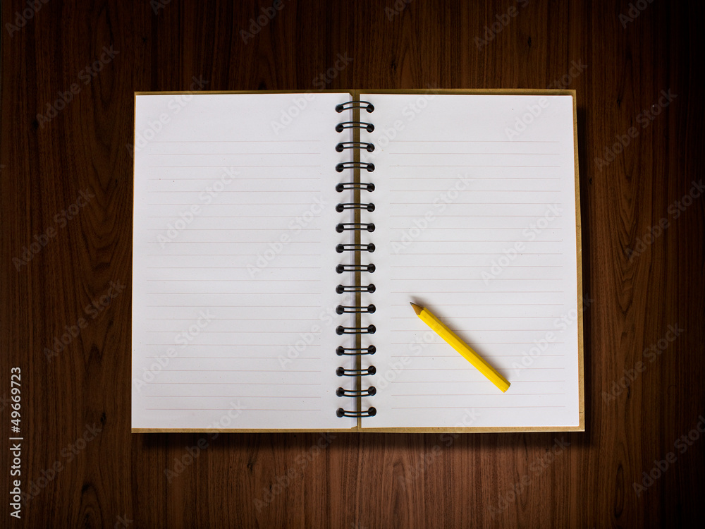 Open blank note book on wood Open blank note book on wood