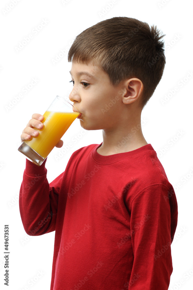 Child drinks orange juice isolated on white background Child drinks orange juice isolated on white background