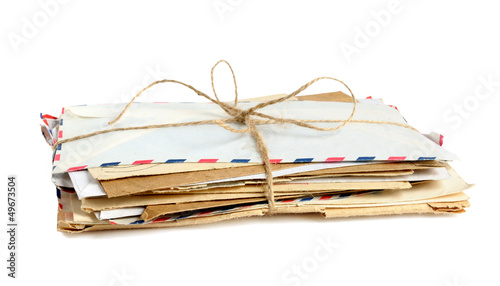 Pile of old envelopes isolated on white background
