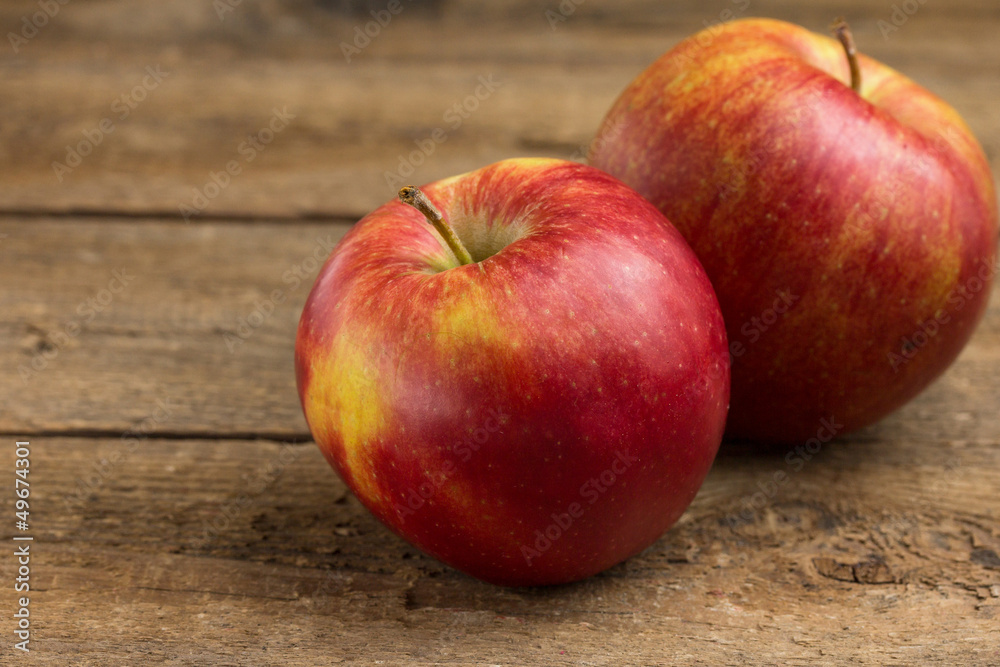 Red apples on a wooden table Red apples on a wooden table