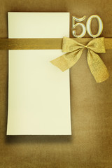 Anniversary card on golden background