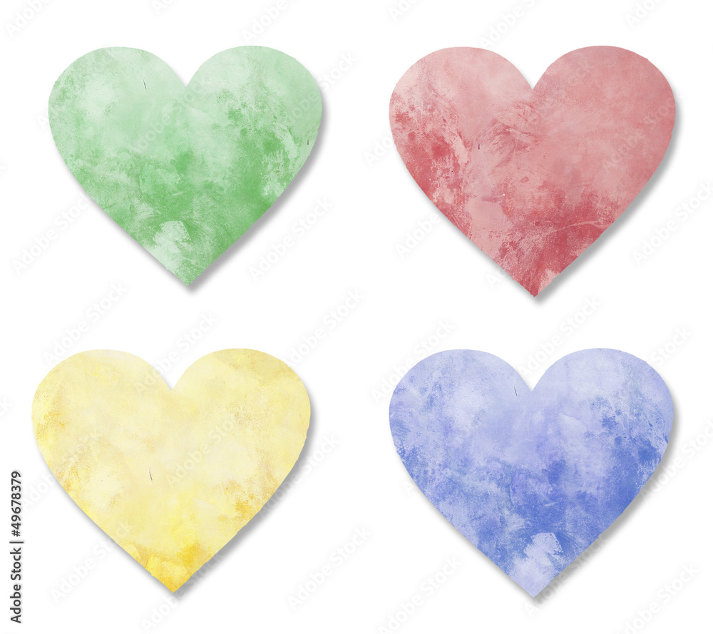 Four Colors of Heart Shape from cement wall background