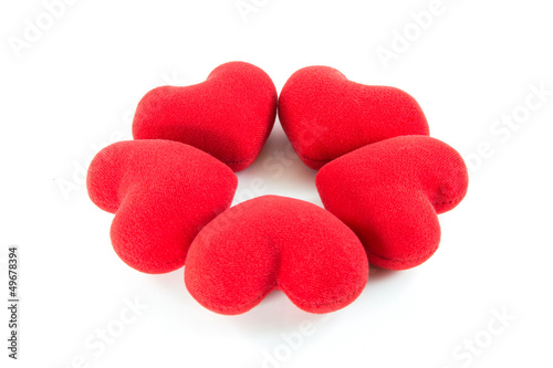 Red hearts in circle shape on white background