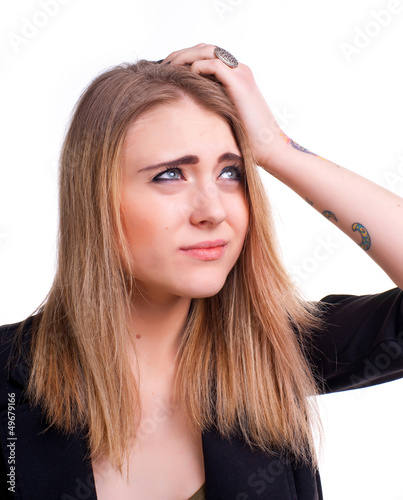 Young girl suffering from headache