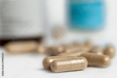 Brown medicine capsules photo