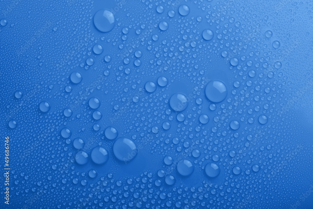 Water drops on blue background