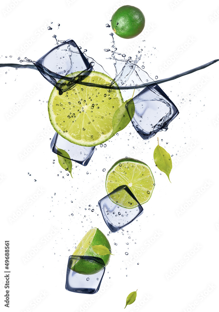 Fototapeta premium Limes with ice cubes, isolated on white background