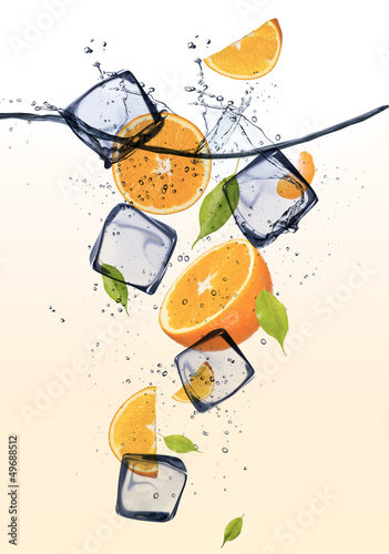 Oranges with ice cubes