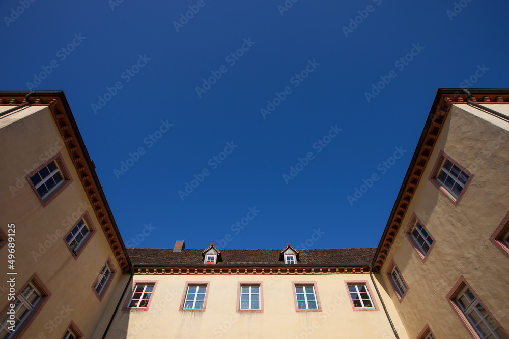 old facade in blue sky
