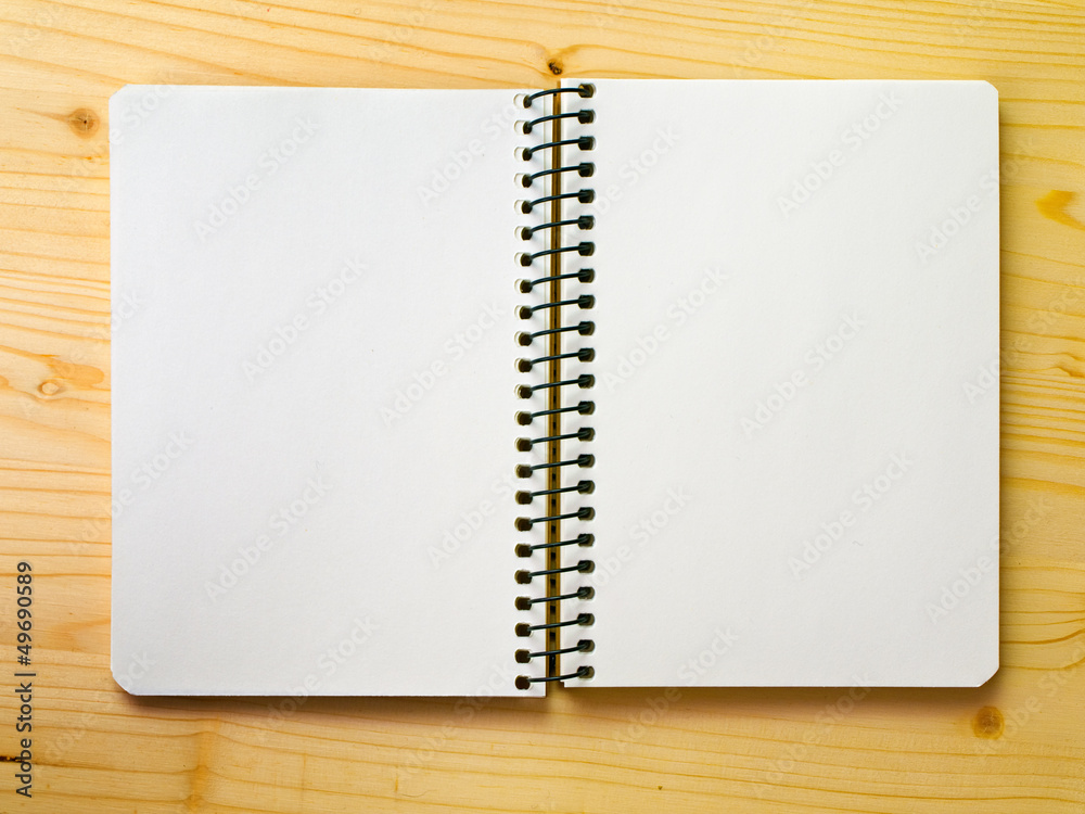 open blank sketchbook on a wood surface Stock Photo