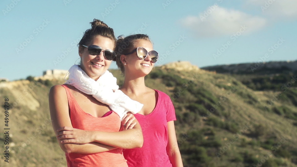Two happy girlfriends on a trip, super slow motion Two happy girlfriends on a trip, super slow motion