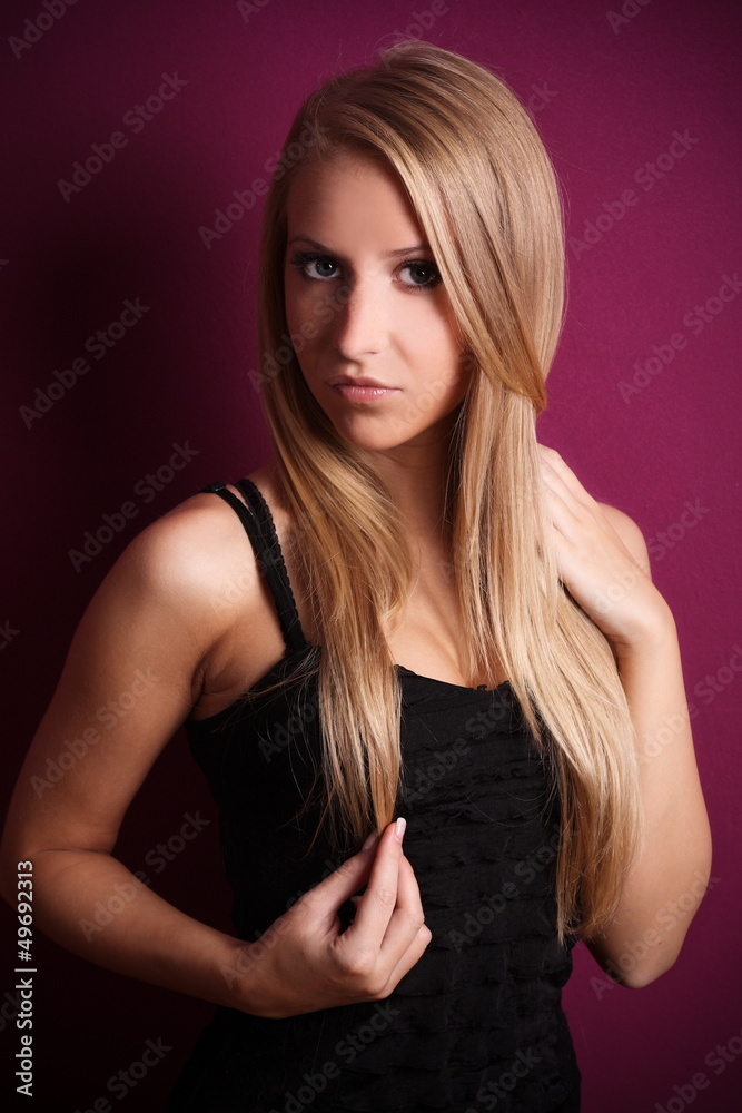beautiful blond woman with violet background