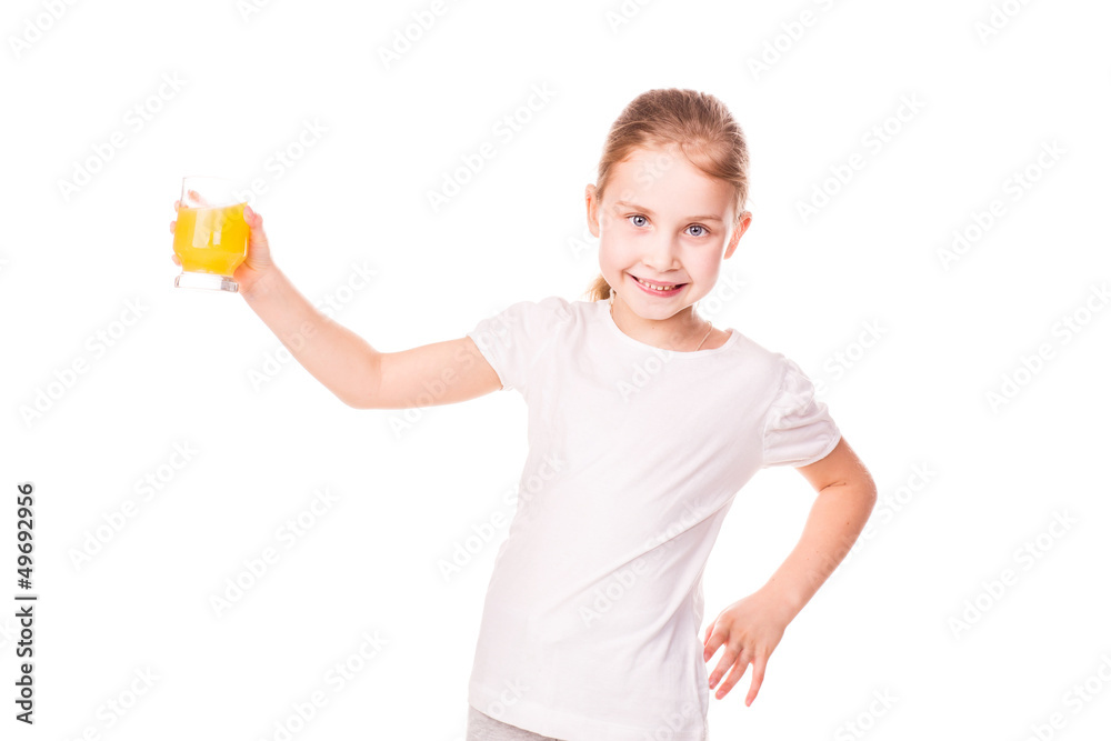 Cute little girl holding glass with juice smiling Cute little girl holding glass with juice smiling