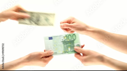 Hands taking banknotes