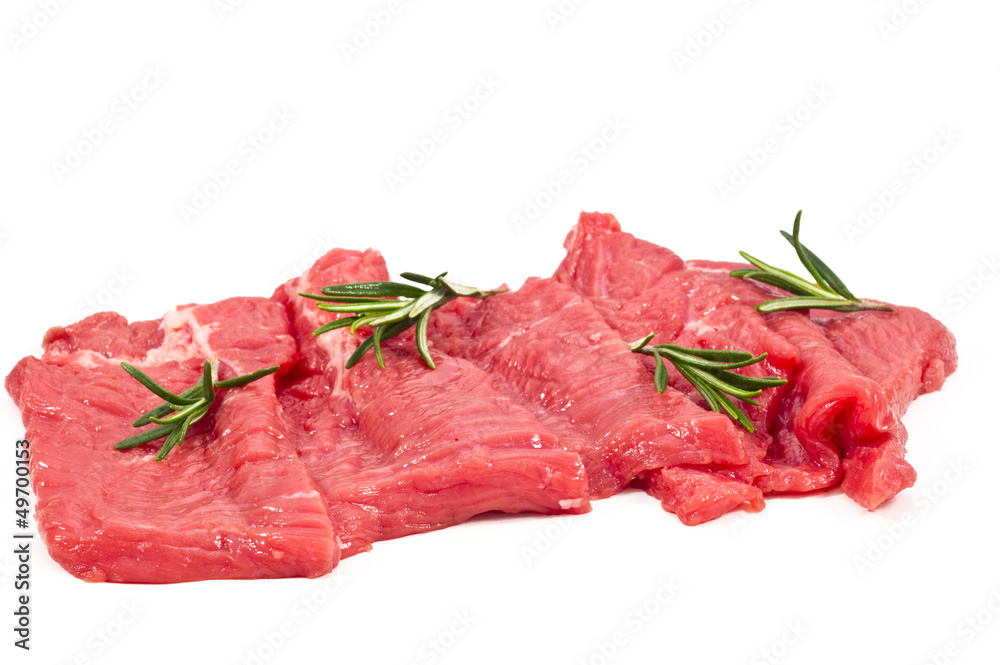 Raw fresh meat sliced  with rosemary