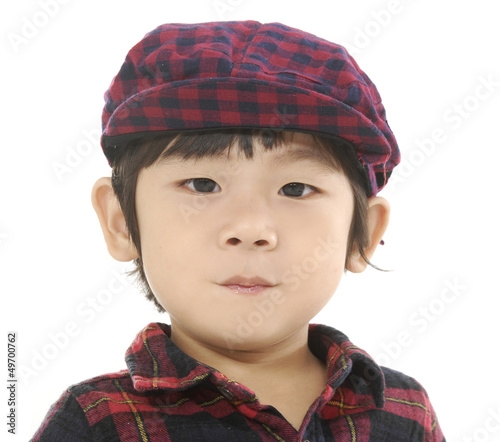 Beautiful little boy. Shot in a studio. Isolated