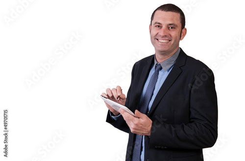 Businessman using digital tablet in office photo