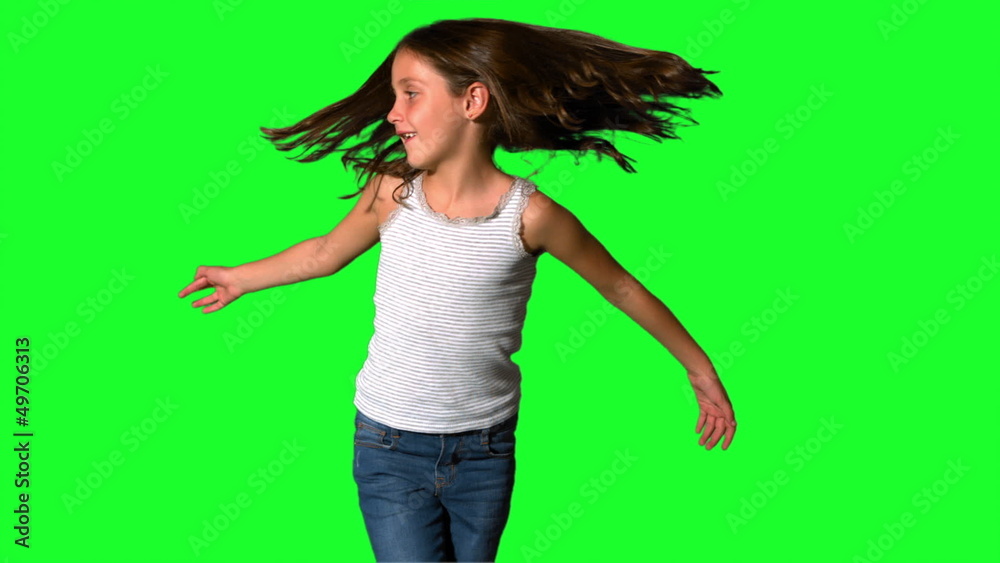 Little girl spinning around on green screen Little girl spinning around on green screen