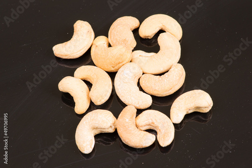 cashew nuts on black background