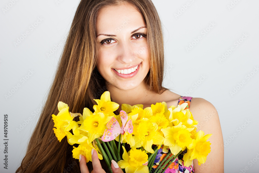 young beautiful teen girl with daffodils young beautiful teen girl with daffodils