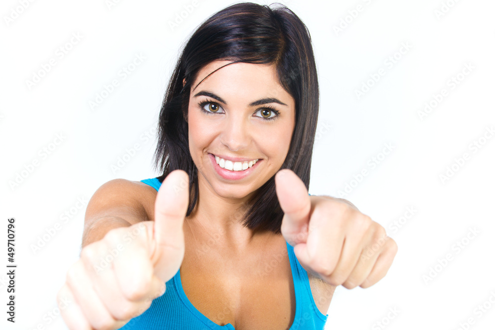 excited young woman gesturing a thumbs up sign excited young woman gesturing a thumbs up sign