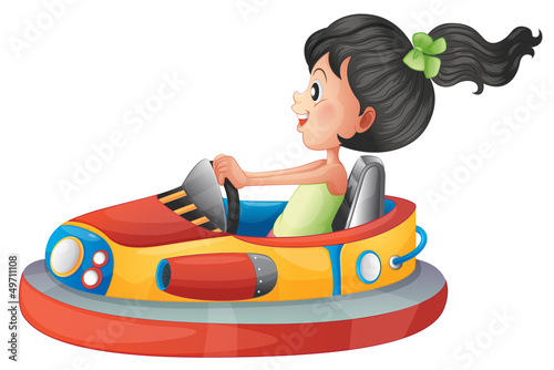 A girl driving the bumpercar