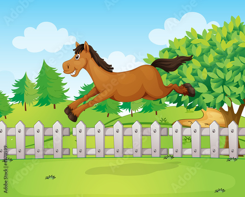 A horse jumping over the fence