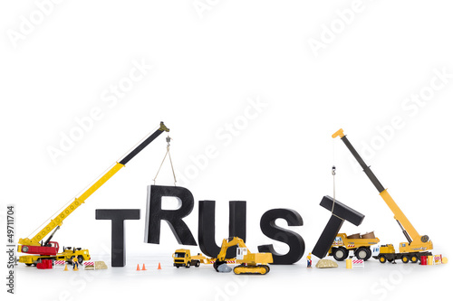 Build up trust: Machines building trust-word. photo