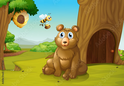 A bear and a bee near a treehouse