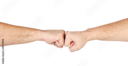 Two male hands as fists together isolated