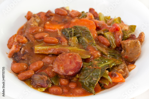 smoked sausages with carrot, beans and cabbage