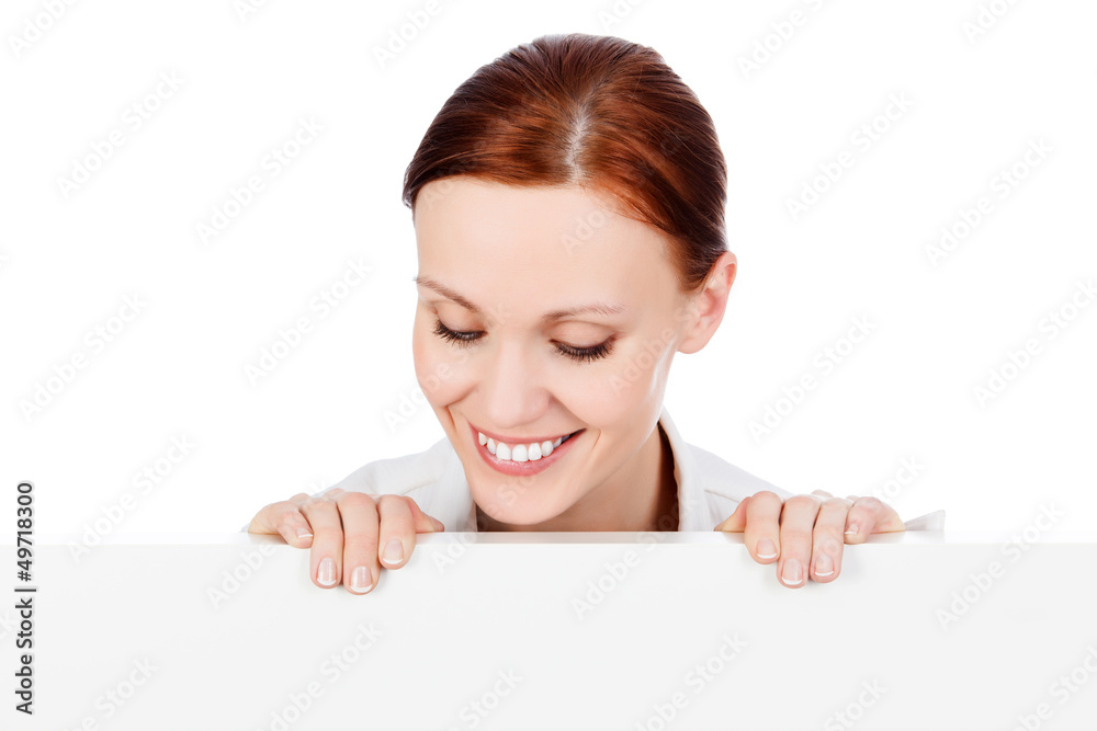 smiling young business woman with a blank signboard smiling young business woman with a blank signboard
