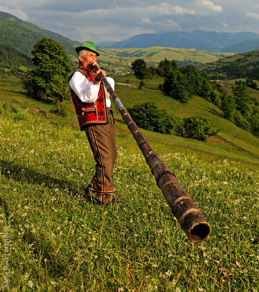 A man with trembitas
