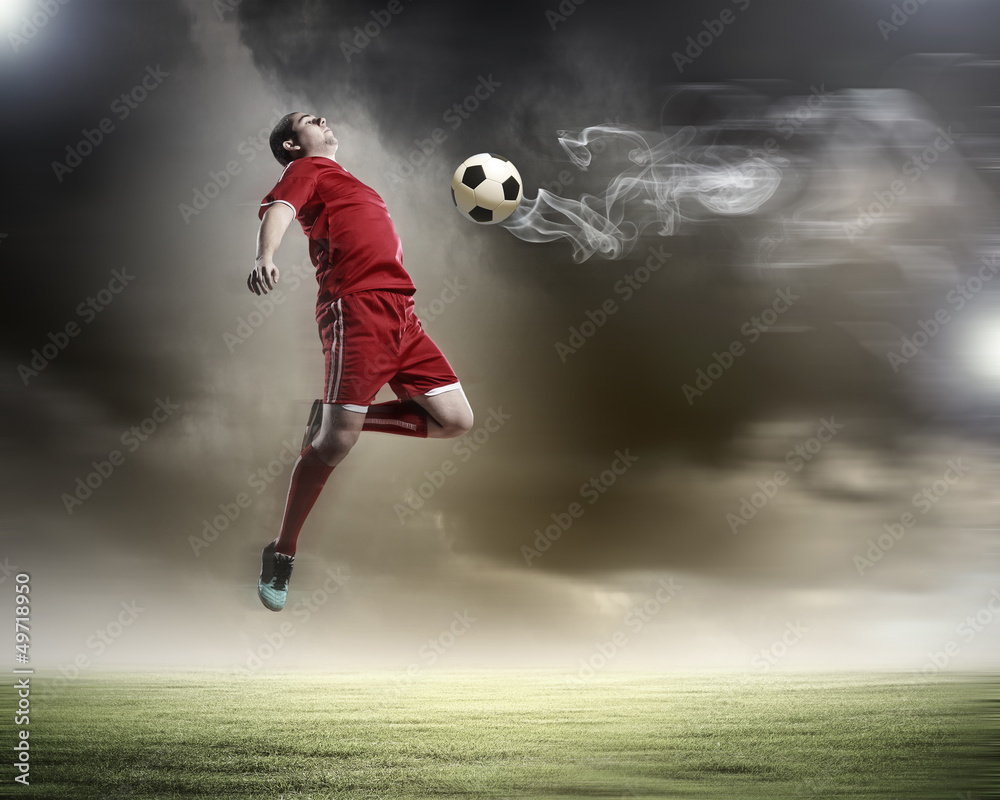 football player striking the ball football player striking the ball