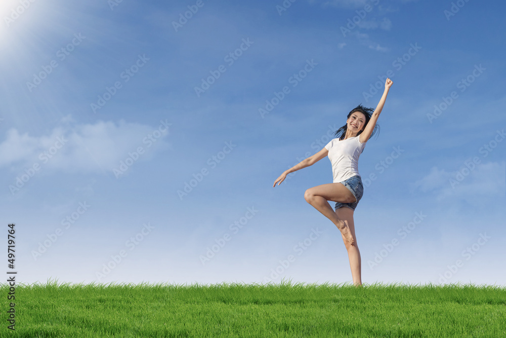Attractive woman gesture on green field Attractive woman gesture on green field